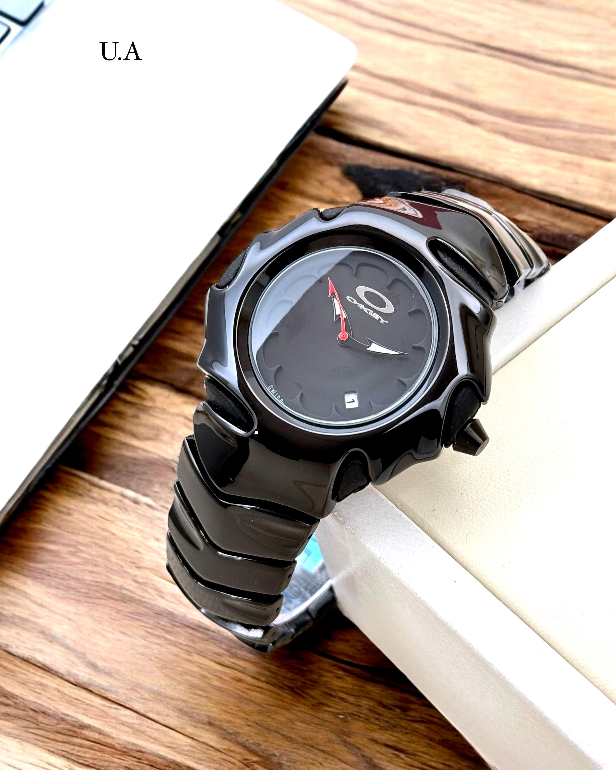 OAKLEY FULL BLACK DATE WORKING METAL WATCH
